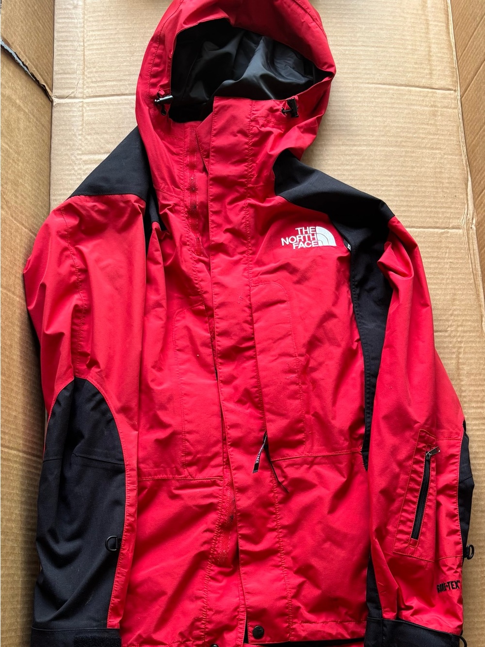 The North Face Red and Black Waterproof Hooded Jacket